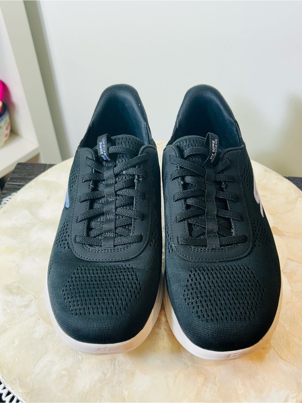 Skechers Women's Black Knit Slip-On Sneakers with White Midsole